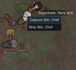 Capture a downed enemy in Rimworld