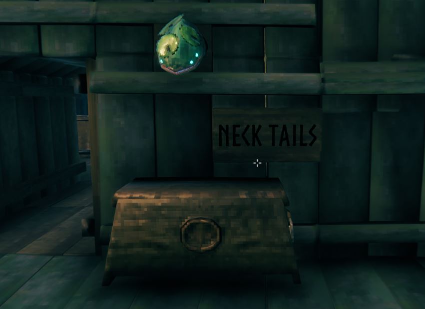 a sign indicating that neck tails are present in a storage box in valheim. A neck trophy is also present in the image