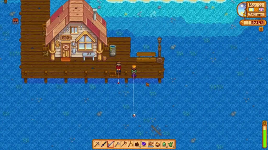 a player fishing in Stardew Valley in the ocean with bait attached to their fishing rod